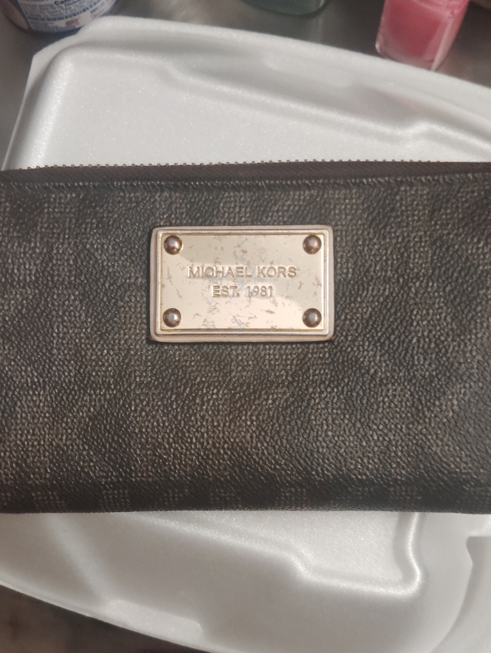 Michael Kors Dark Brown Textured Zip Wallet with Gold Plate